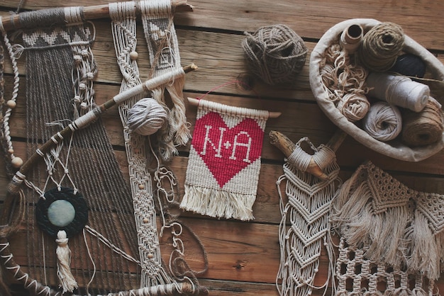 embroidered textiles arranged on wooden table